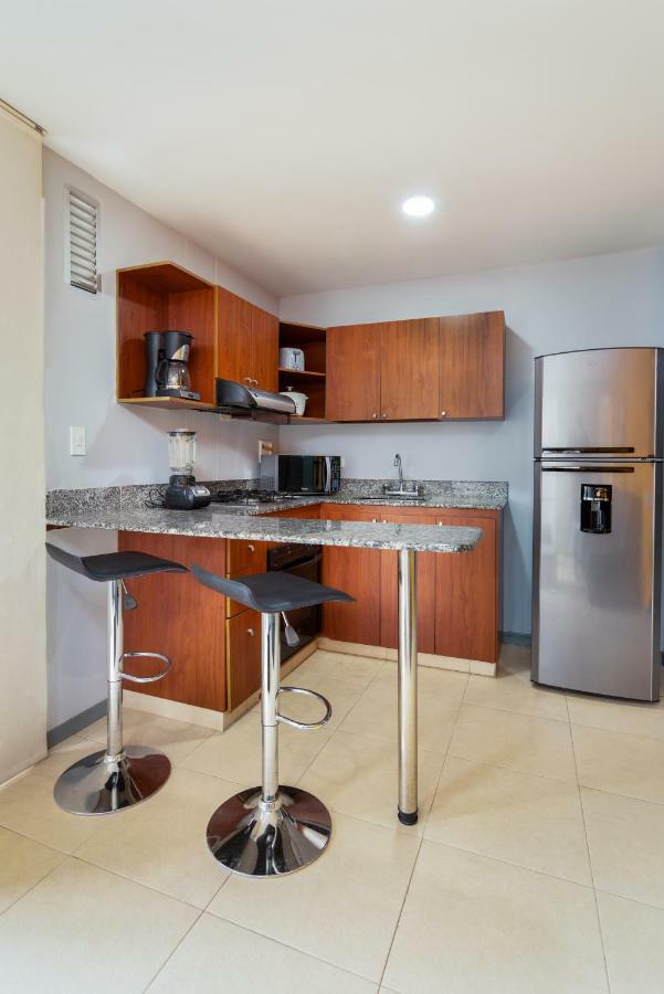 Cyan Suites Poblado By Mde Bnb Медельин Экстерьер фото